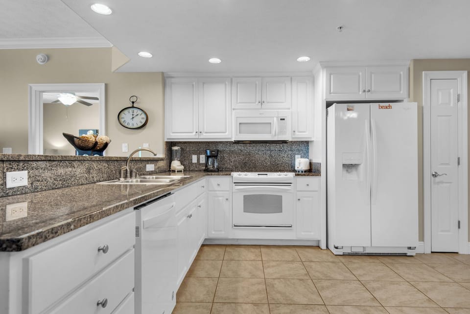 Condo, Multiple Beds, Balcony (Treasure Island 1911) | Private kitchen | Coffee/tea maker, fridge, microwave, oven