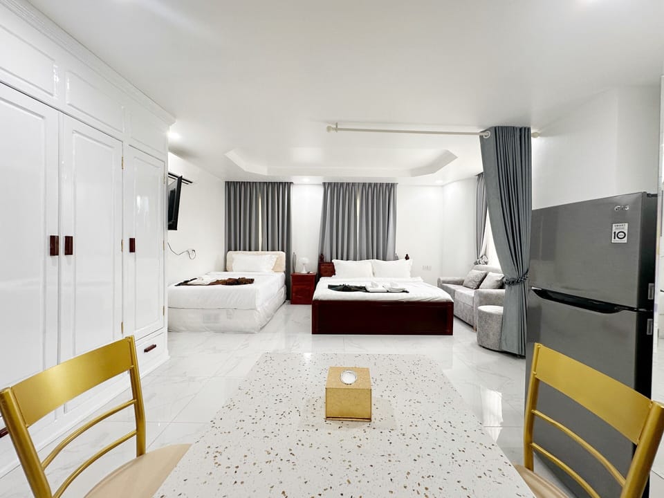 Family Triple Room, City View | Premium bedding, pillowtop beds, soundproofing, free WiFi