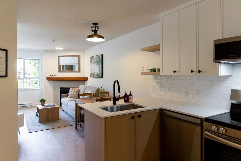 An open concept NEWLY renovated space. Equipped with all your baking and cooking needs. Enjoy an updated kitchen with all the comforts of home: coffee, tea, oil, salt, pepper and more!