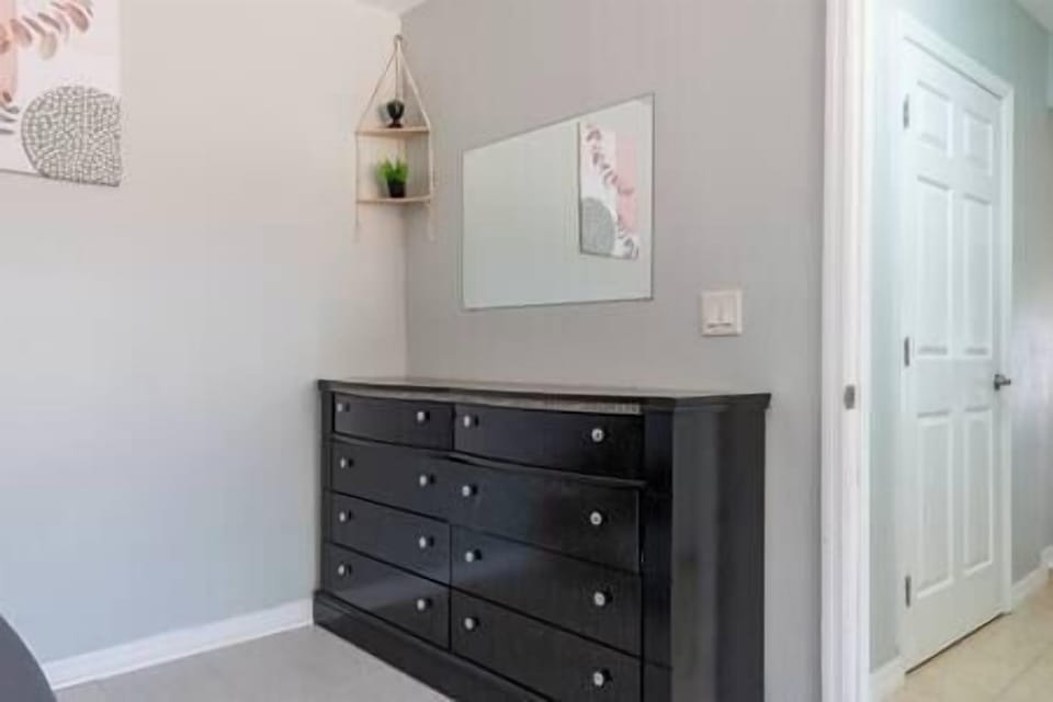 Make yourself at home and put away your clothes in the dresser!