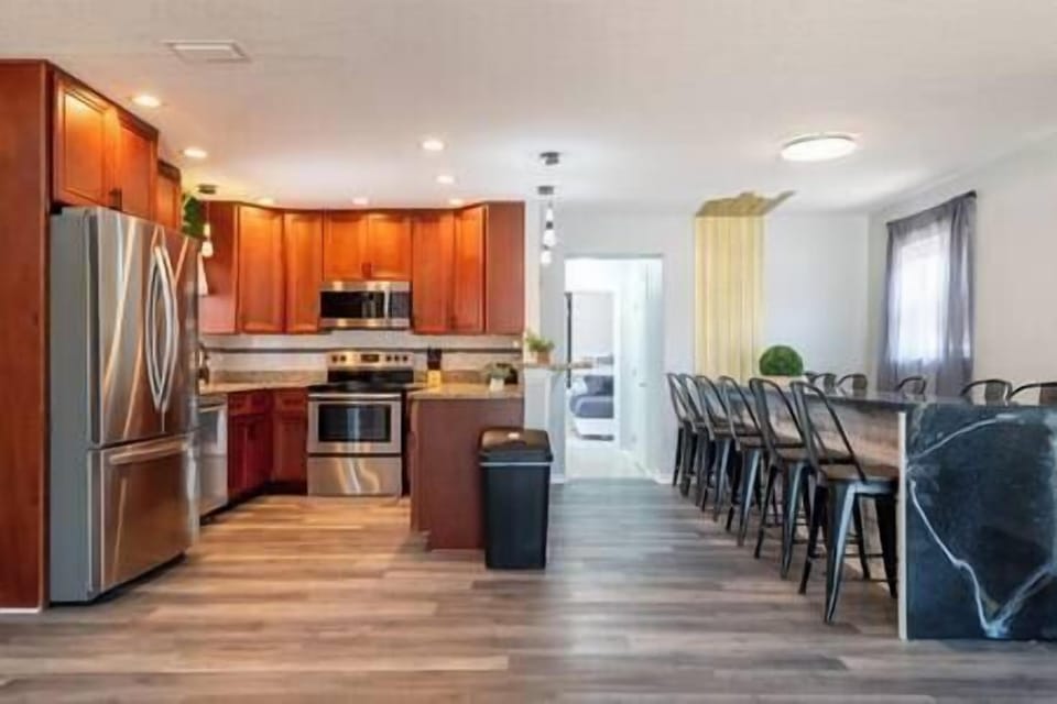 Move easily between the kitchen and dining area with our open layout