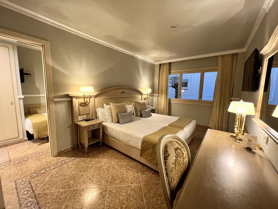 Standard Quadruple Room | Premium bedding, minibar, in-room safe, desk