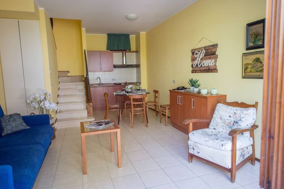 Comfort Apartment, Hill View | Living area | 24-inch LCD TV with digital channels
