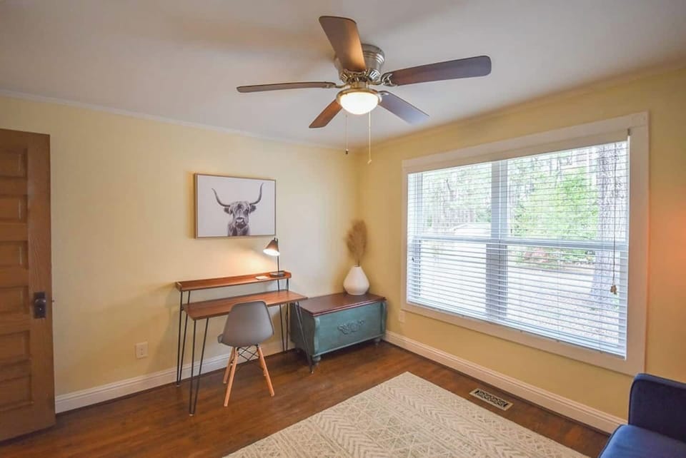 The large dreamy window makes the fourth bedroom a perfect space for desk work, morning meditation, or movement.