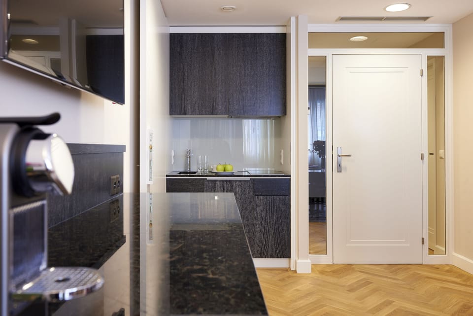 Deluxe Apartment | Private kitchen | Full-size fridge, coffee/tea maker, electric kettle, toaster