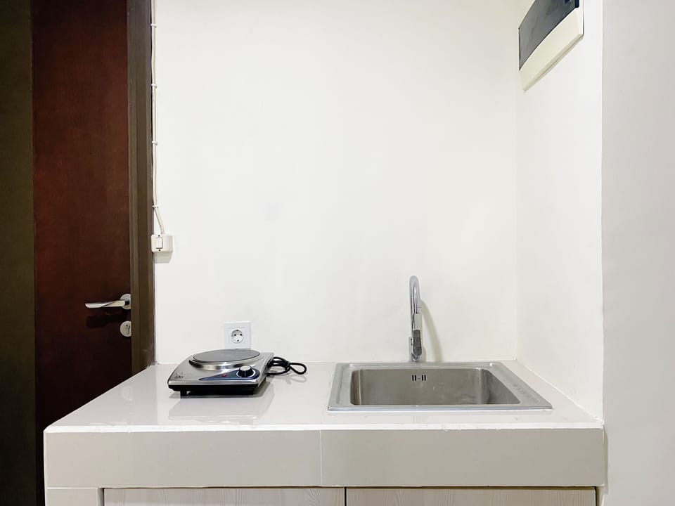 Fridge, stovetop, dining tables