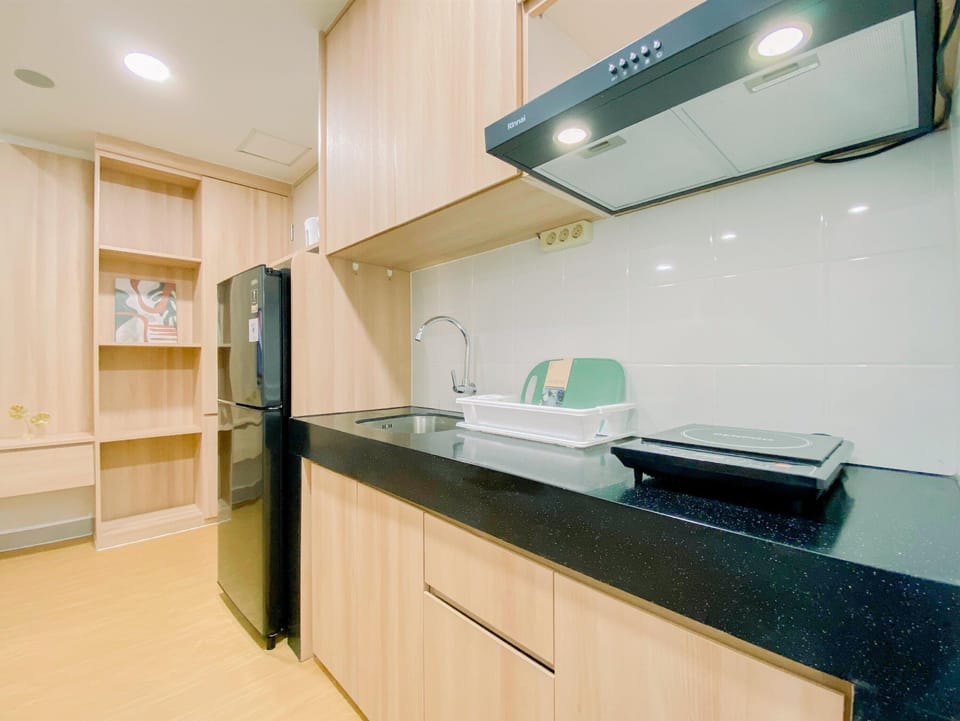 Apartment | Private kitchen | Fridge, stovetop, rice cooker, dining table