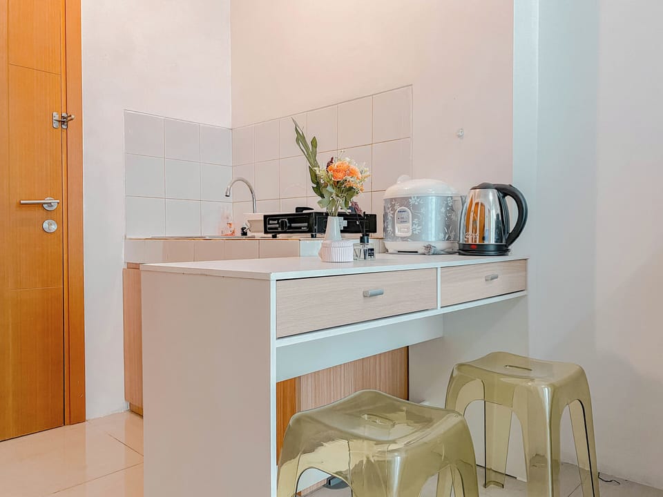 Apartment | Private kitchen | Fridge, stovetop, rice cooker, dining tables
