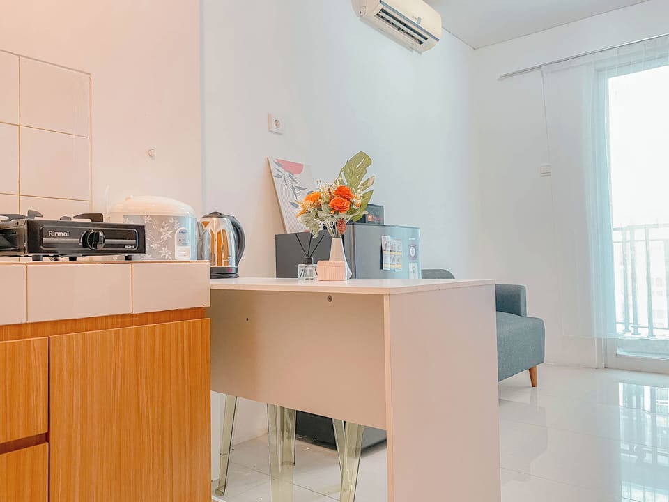 Apartment | Private kitchen | Fridge, stovetop, rice cooker, dining tables