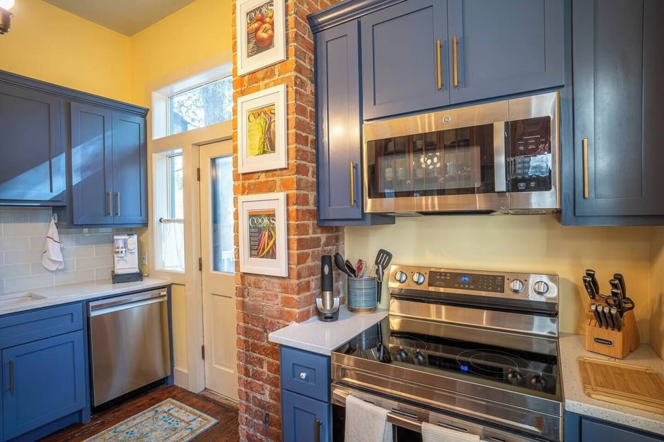 New cabinets complement the original ones, with details picked to play off of the old latches.