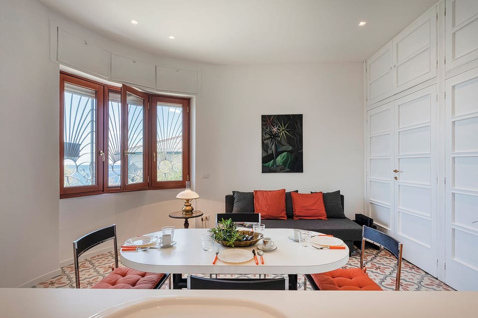 Apartment, Sea View | Living area | 35-cm TV with digital channels