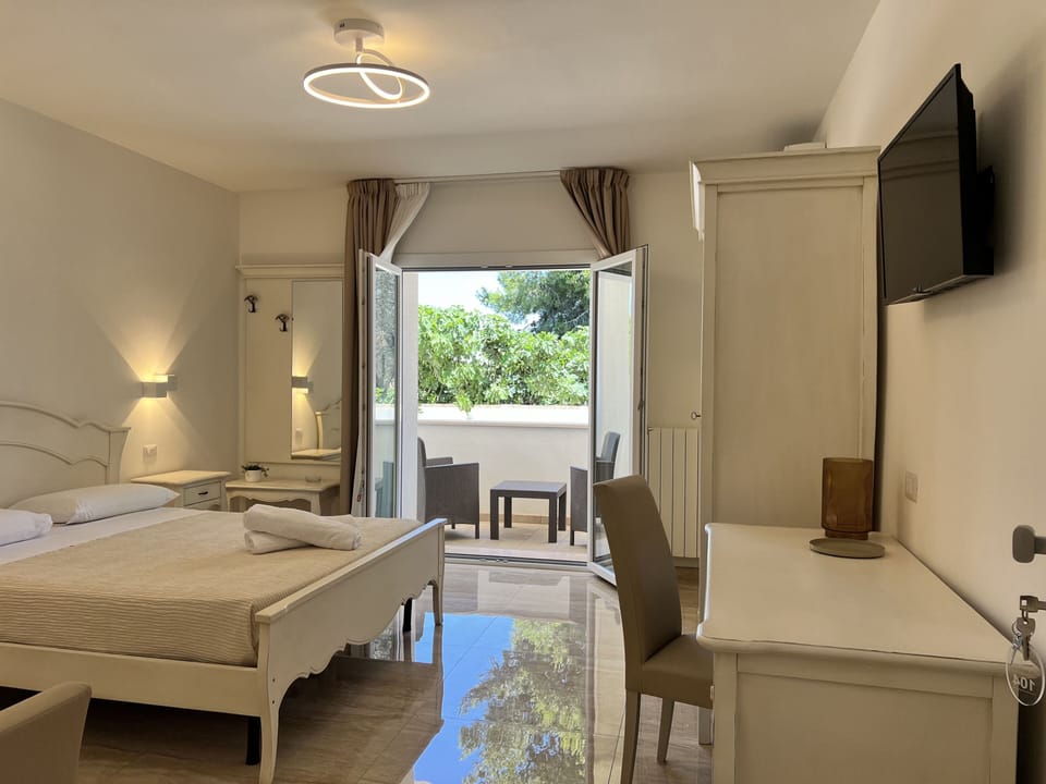 Classic Triple Room, Garden View | Premium bedding, down comforters, minibar, in-room safe