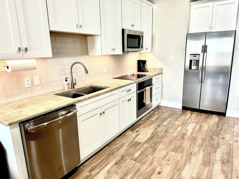 Modern Kitchen with stainless steel appliances 