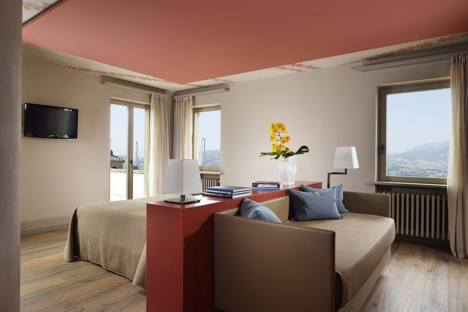 Suite, Terrace (Montefeltro) | Minibar, in-room safe, desk, soundproofing
