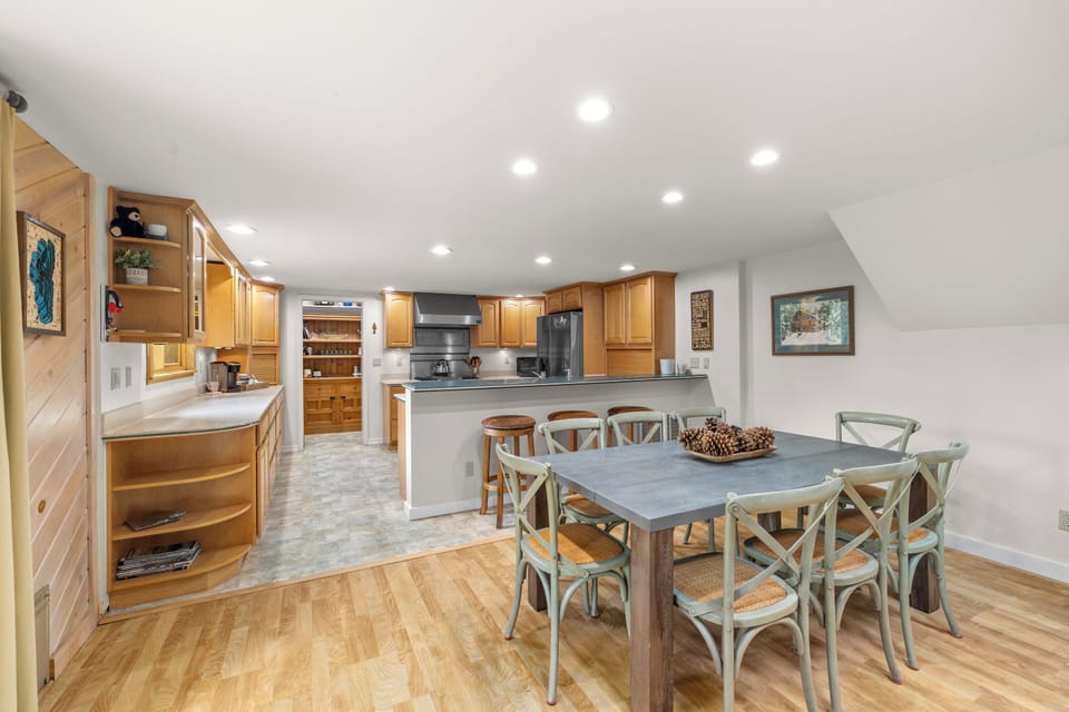 Dining table for 8 with an additional breakfast bar for 3