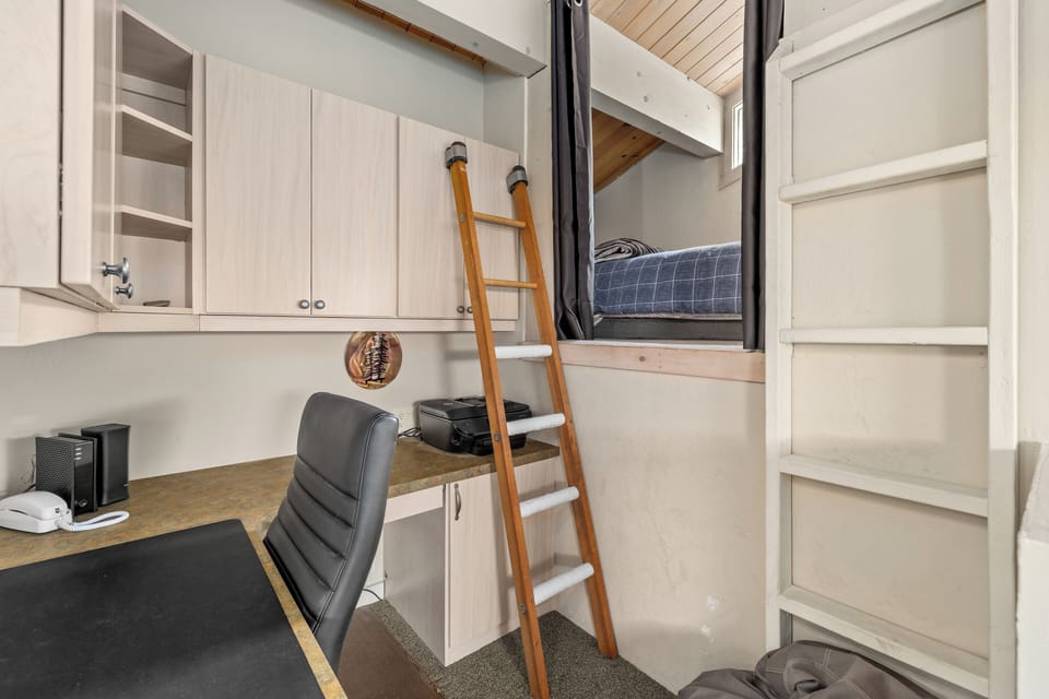 Sleeping loft above office space-enter via a small ladder-furnished with a twin