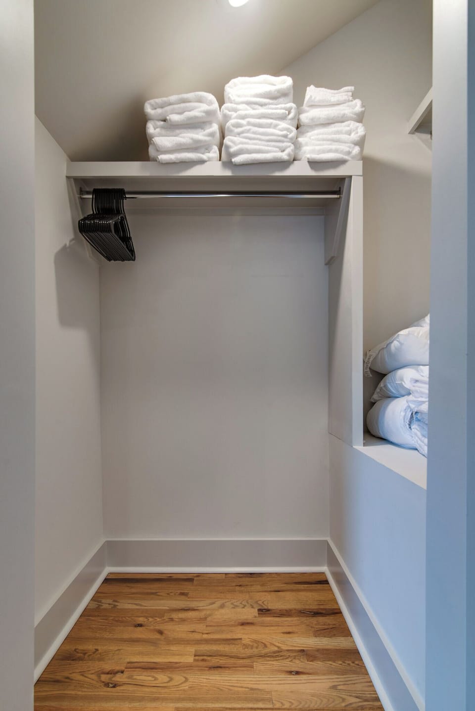 Keep things organized with the handy walk-in, open-air closet.