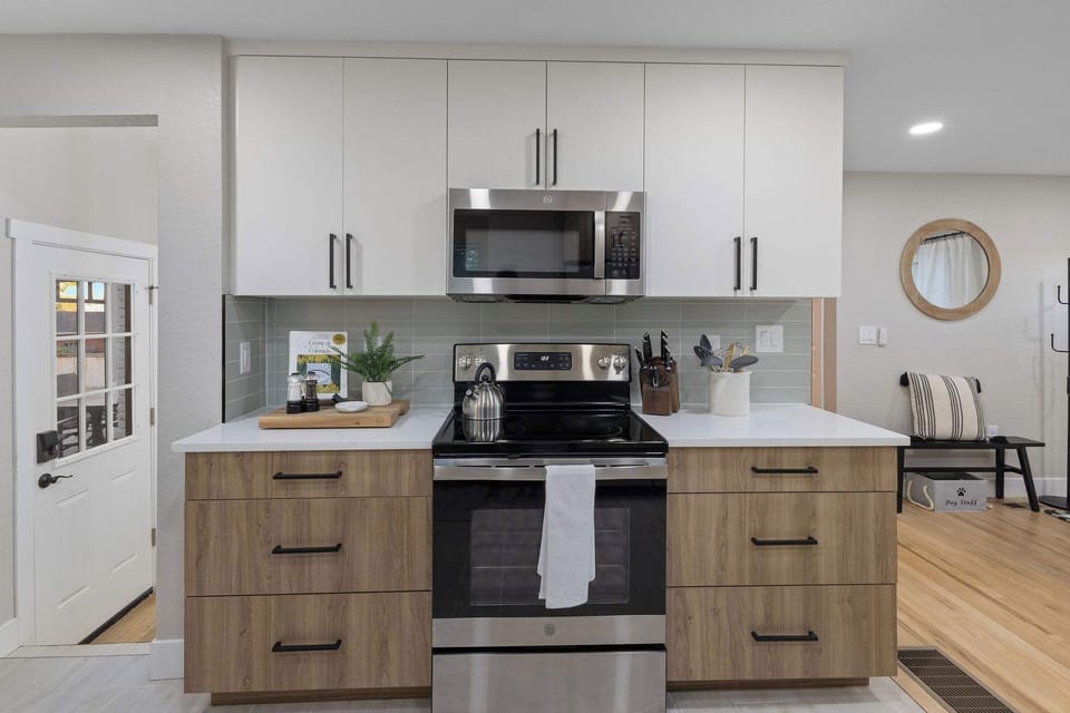 The kitchen is always stocked with dishes, utensils, silverware and cookware.