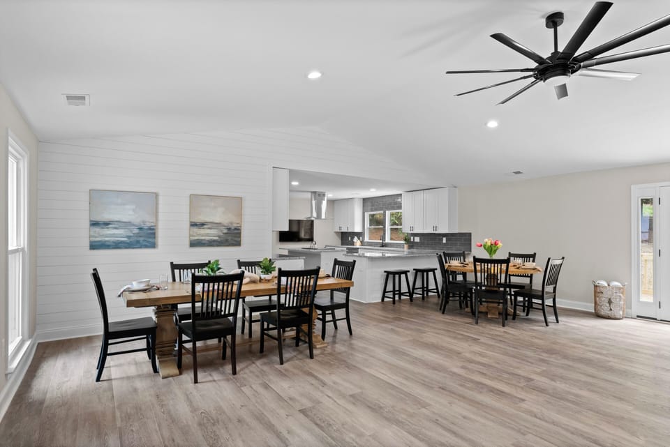 Two dining areas next to the kitchen. 