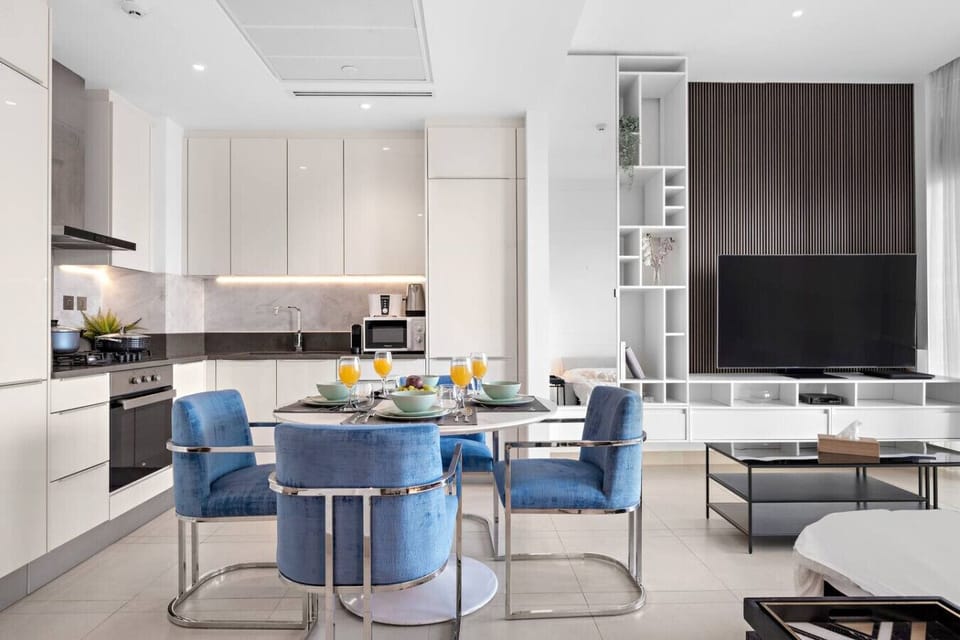 Dining Area: Enjoy meals in style with modern decor and vibrant accents in this sleek space!