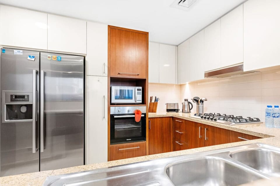 Kitchen: Cook up culinary delights in this stylish, fully-equipped kitchen with modern appliances!