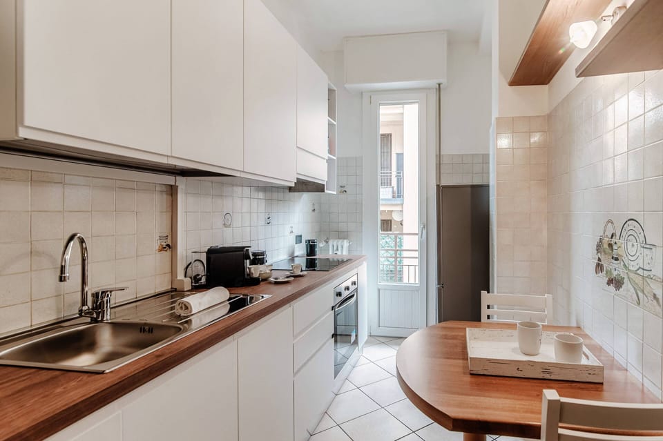 Apartment, Balcony | Private kitchen | Full-size fridge, microwave, oven, stovetop