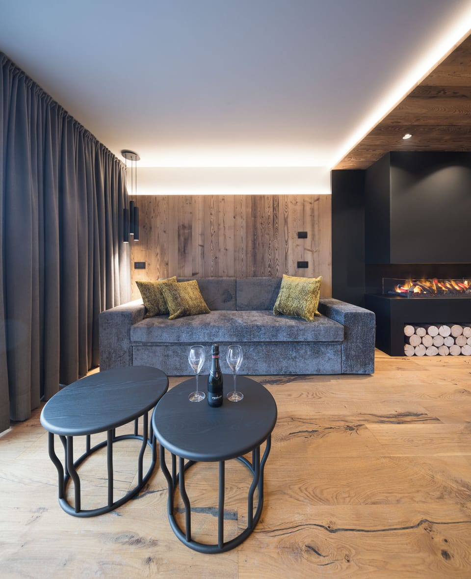 Luxury Apartment, Mountain View | Living area | 50-inch Smart TV with digital channels, fireplace, heated floors