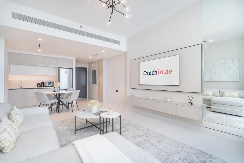 Luxury Apartment, Balcony, Sea View | Living area | 50-inch Smart TV with cable channels