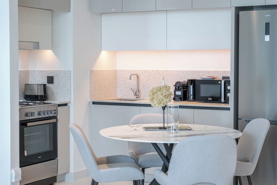 Luxury Apartment, Balcony, Sea View | Private kitchen | Fridge, microwave, oven, stovetop