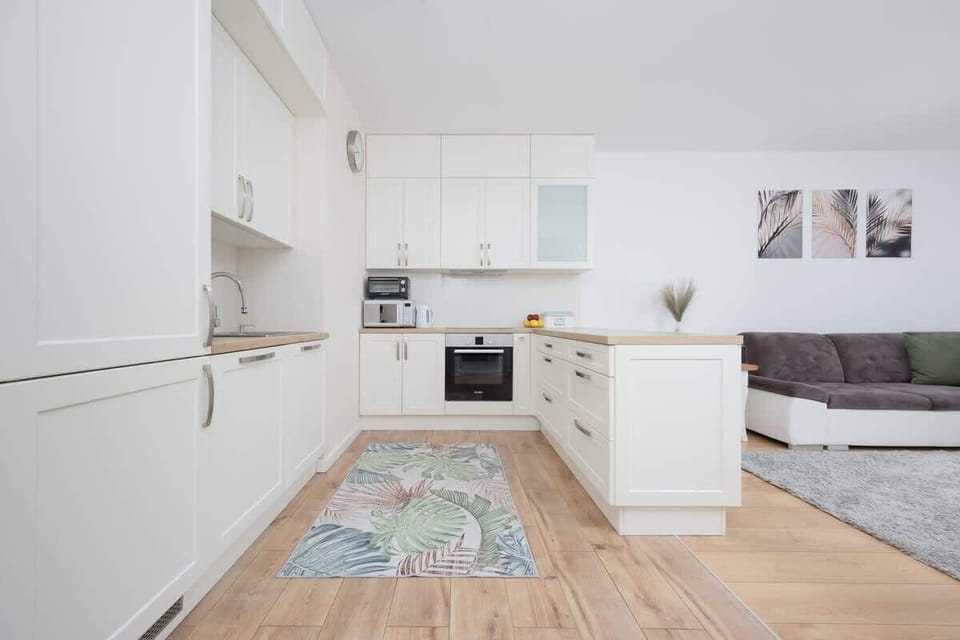 The kitchenette's practical layout maximizes space and functionality.