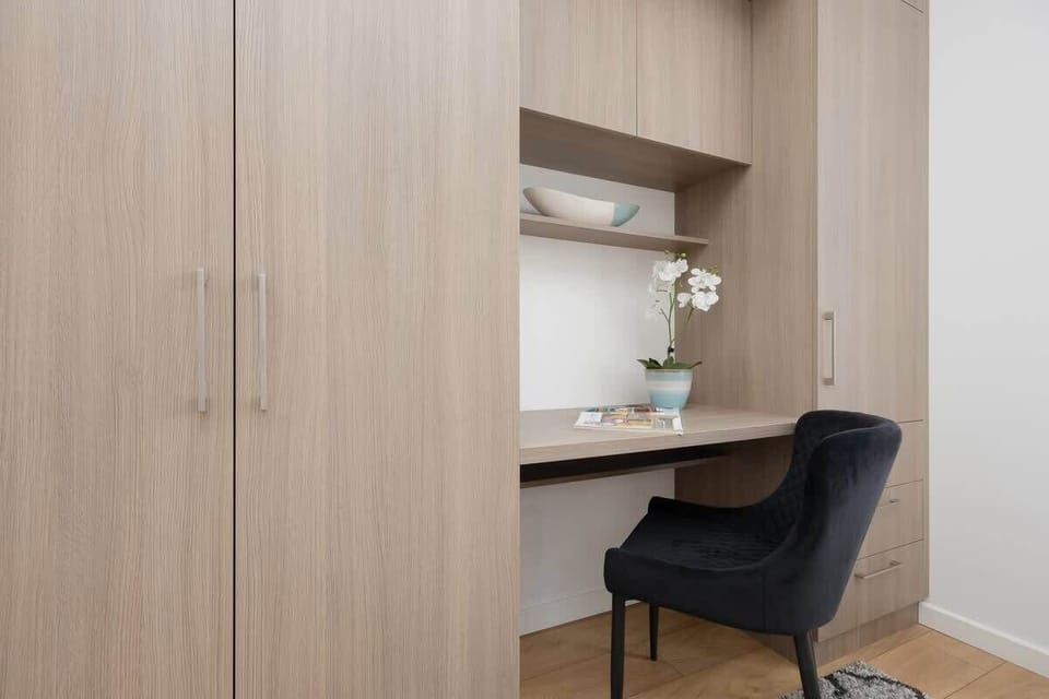The bedroom's modern design ensures a comfortable stay. 
