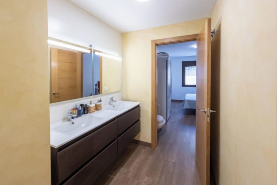 Shower, slippers, bidet, towels