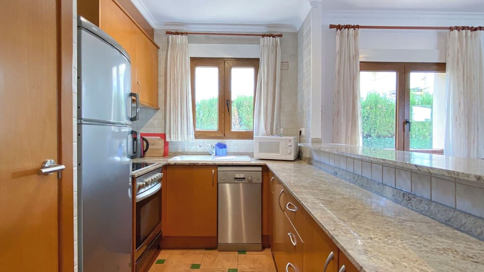 Villa | Private kitchen | Fridge, microwave, oven, stovetop