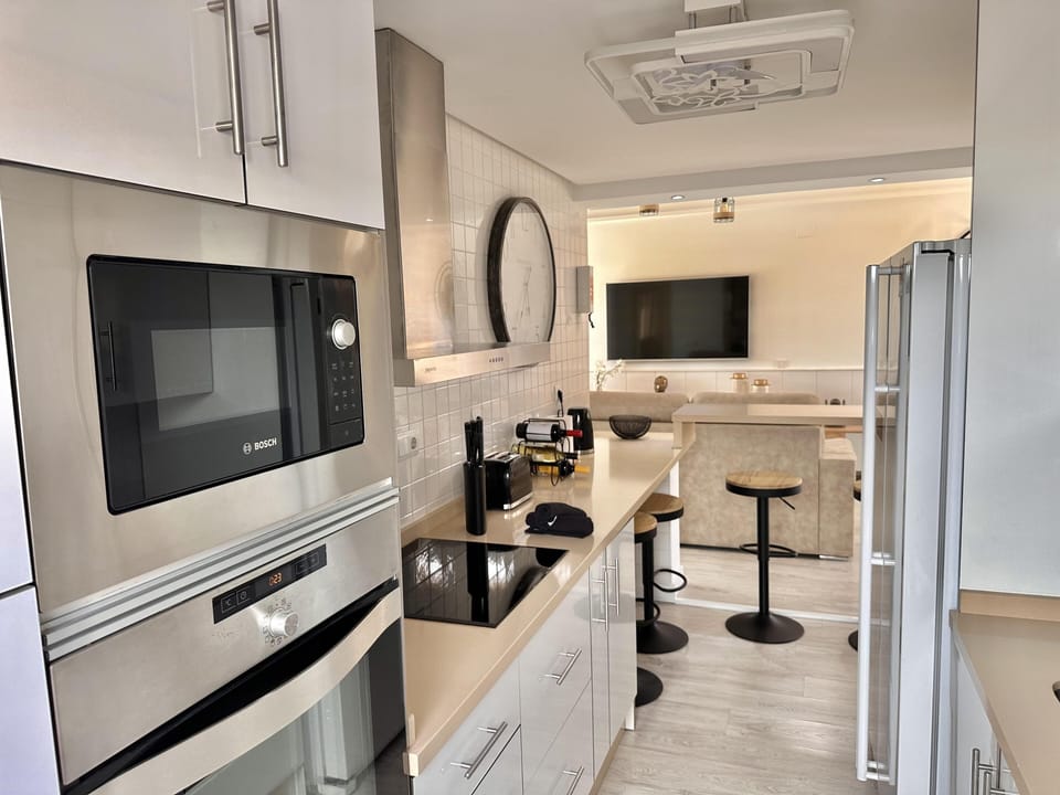 Villa | Private kitchen | Fridge, oven, stovetop, dishwasher