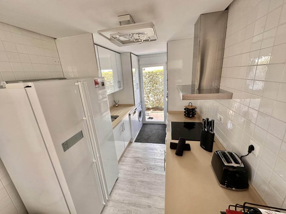 Villa | Private kitchen | Fridge, oven, stovetop, dishwasher