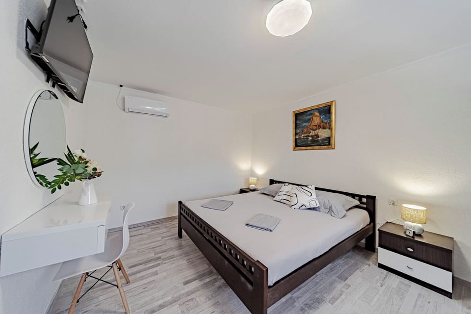Family House, Multiple Bedrooms, 2 Bathrooms (Holiday Home Luce with Pool) | 2 bedrooms, iron/ironing board, free WiFi, bed sheets