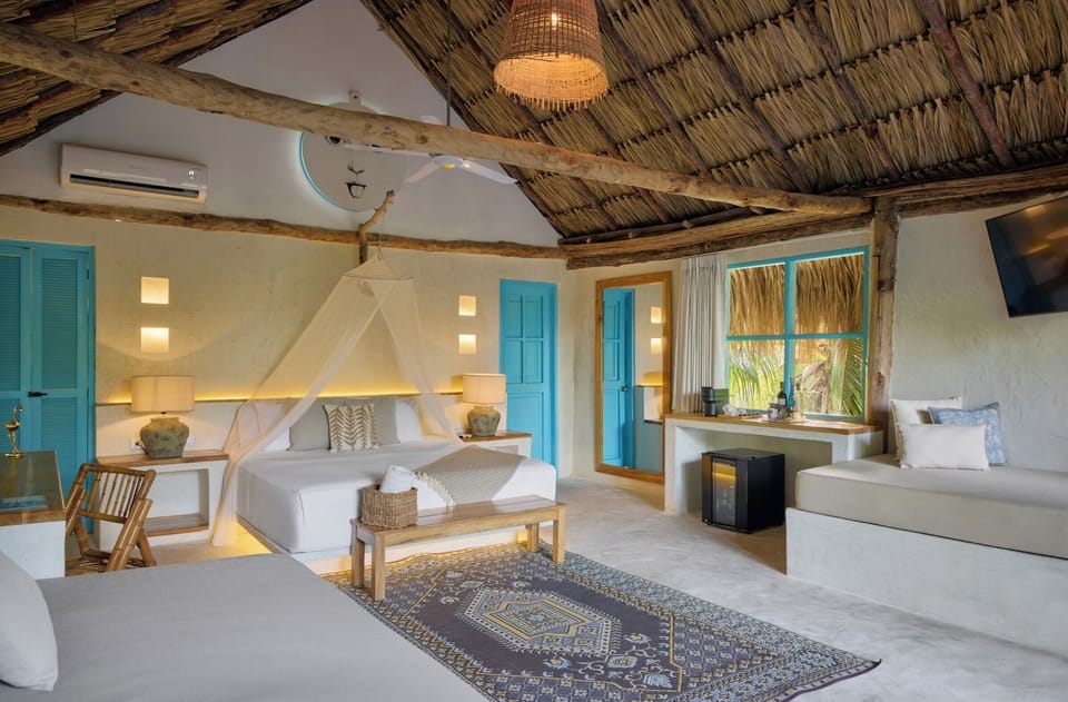 Deluxe Bungalow, Multiple Beds, Garden View, Garden Area | Premium bedding, minibar, in-room safe, laptop workspace