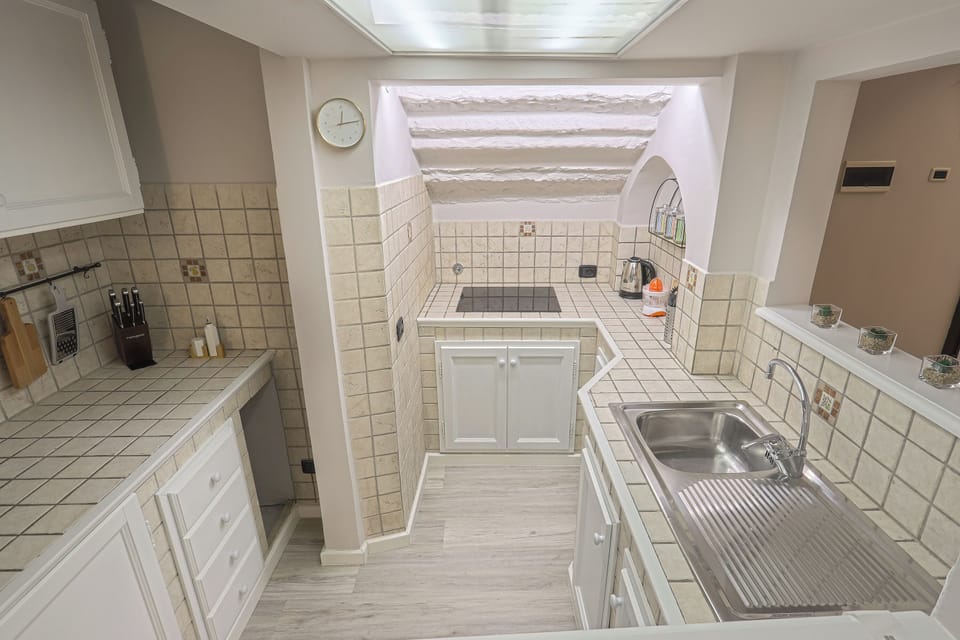 Apartment | Private kitchen | Full-size fridge, microwave, stovetop, espresso maker