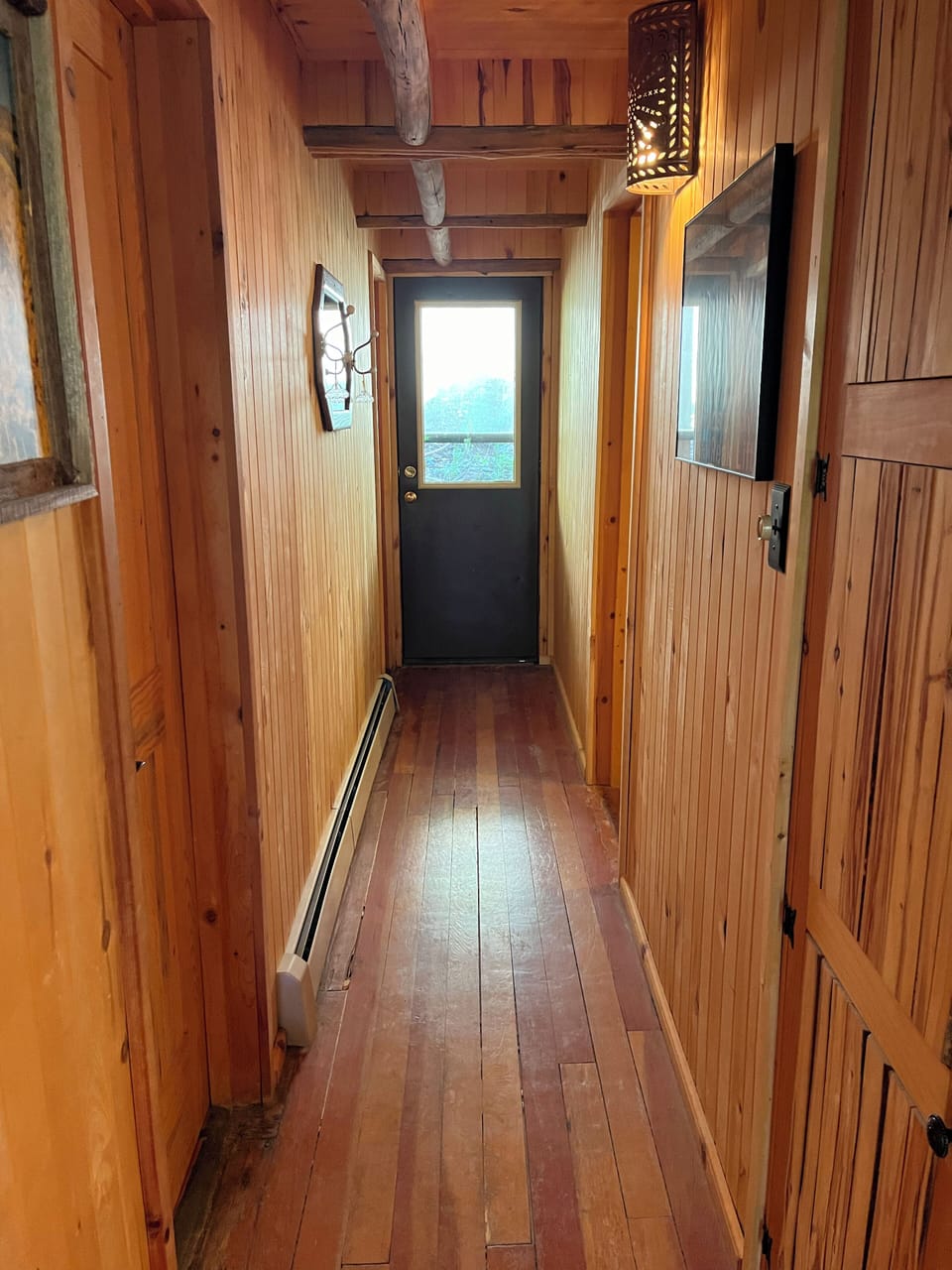 Hallway with bedroom and bathroom