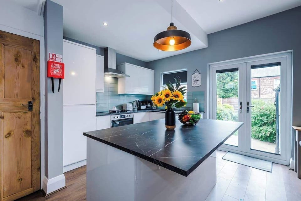 The fully equipped kitchen has everything you need for a long or short stay in Manchester.