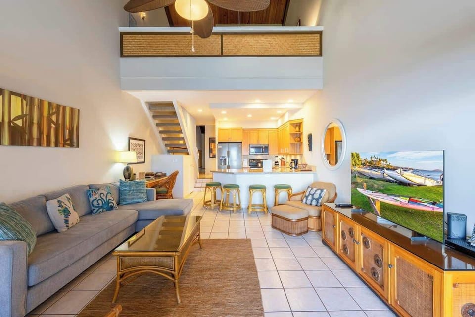 Beautiful Hawaiiana decor throughout this 2 story loft style condo