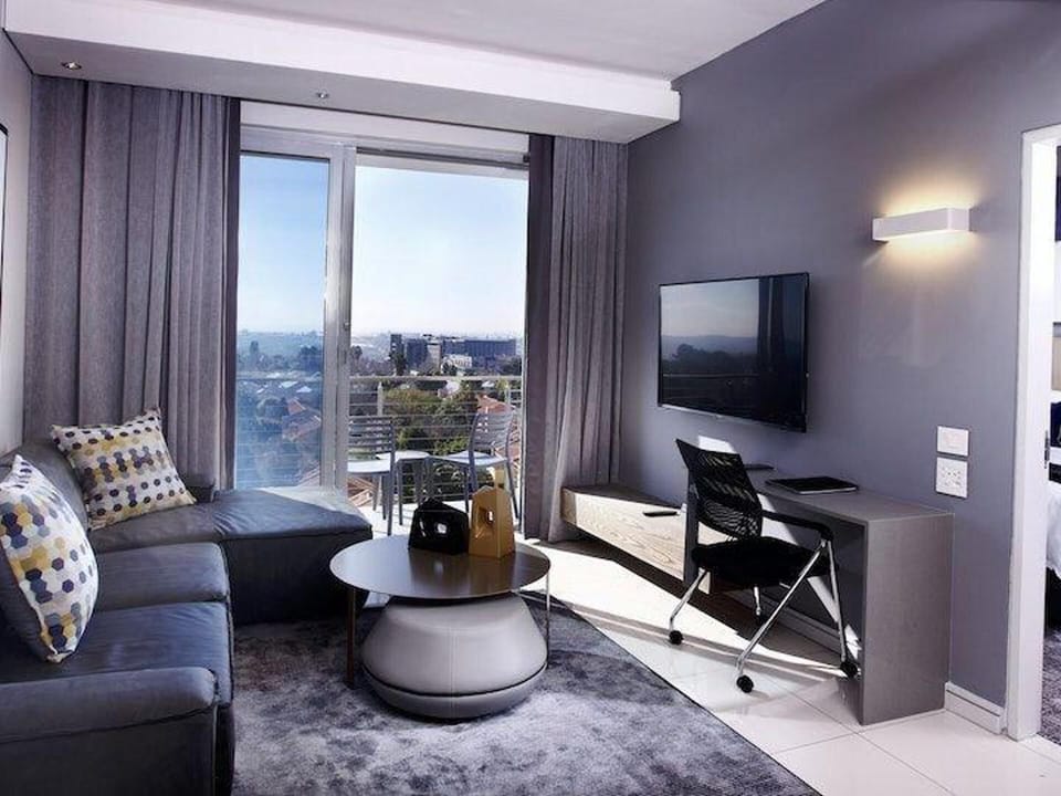 Apartment | Living area | TV, fireplace