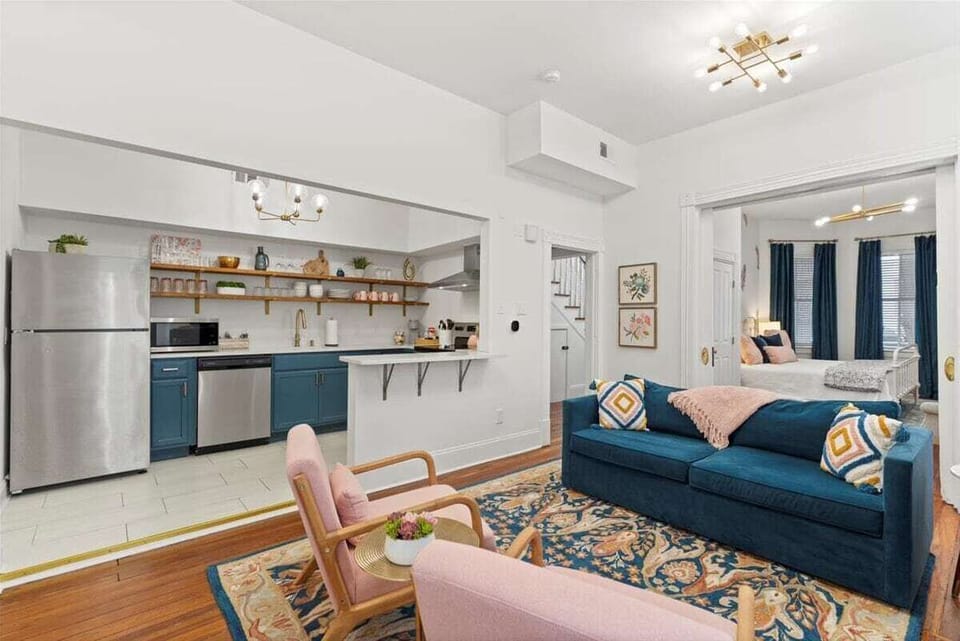 An open, airy living space that flows effortlessly into the kitchen.