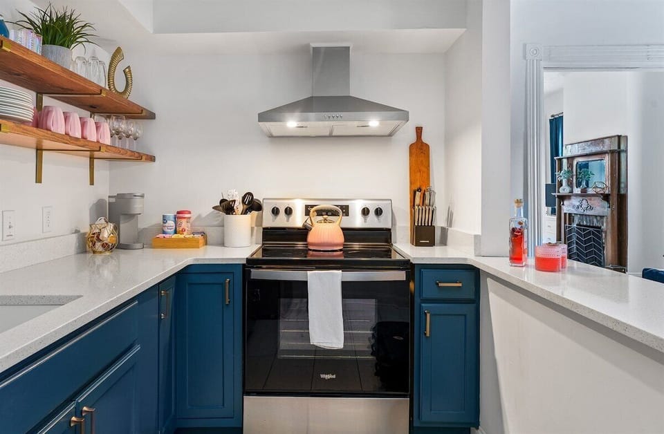 This bright, beautifully stocked kitchen is made for cooking, gathering, and lingering just a little longer.
