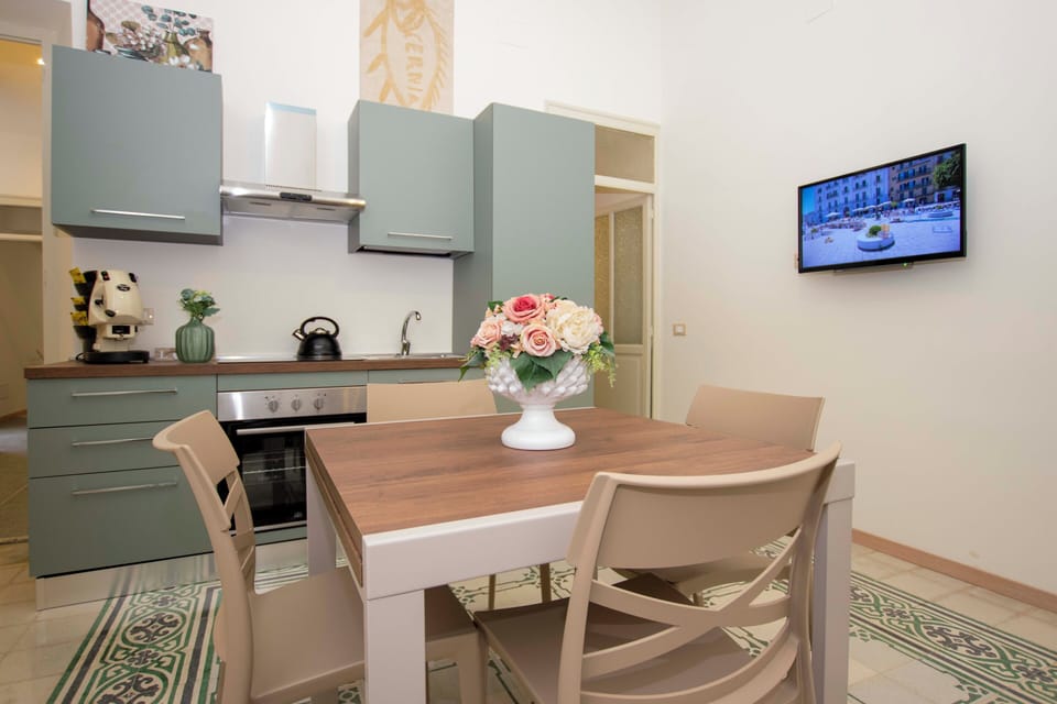 Family Quadruple Room | Private kitchen | Shared fridge, microwave