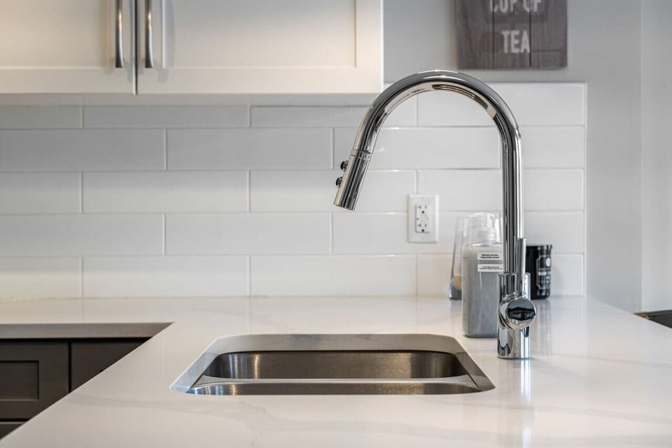 Full kitchen with island seating, Keurig & drip coffee maker, blender & more.