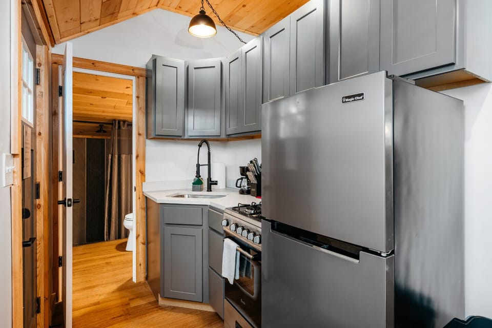 Delight in cooking with modern appliances and chic design that inspire culinary adventures during your Traverse City escape!