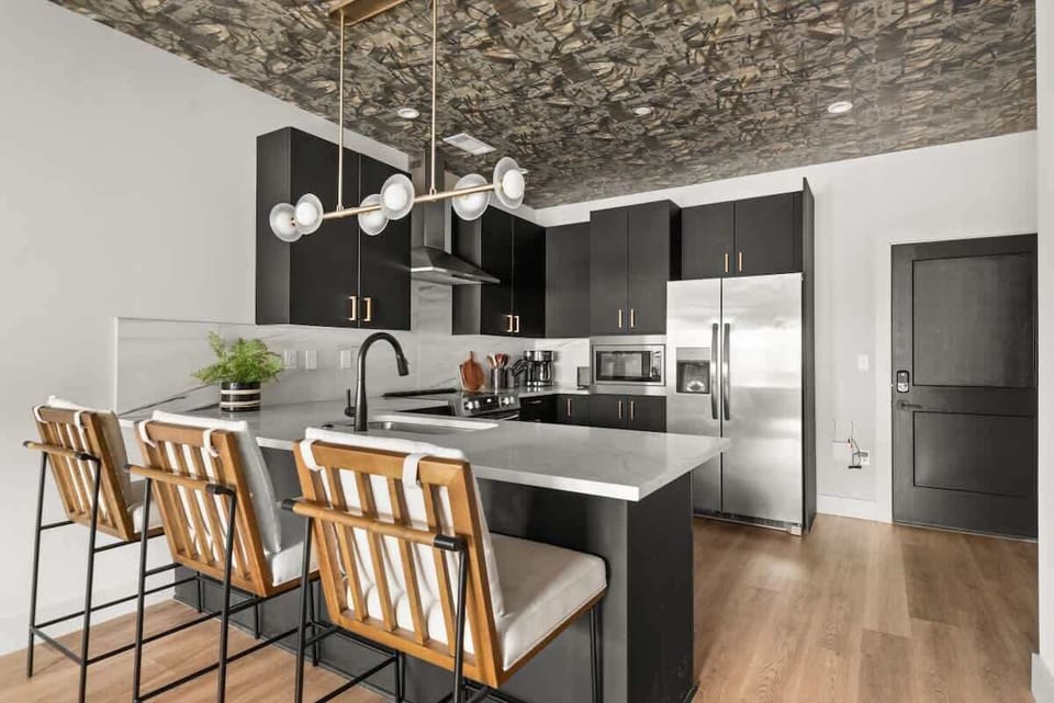 Modern kitchen with stainless steel appliances
