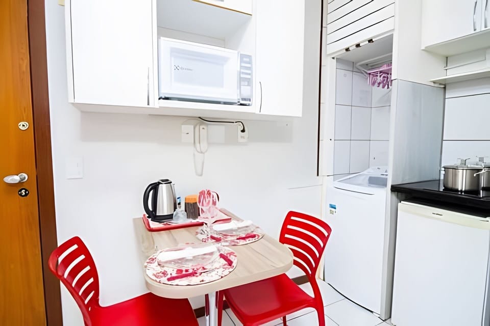 Apartment | Private kitchen | Mini-fridge, microwave, stovetop, cookware/dishes/utensils