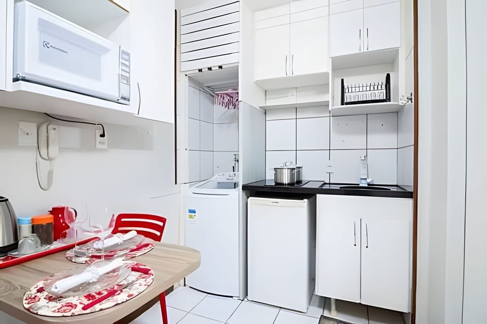 Apartment | Private kitchen | Mini-fridge, microwave, stovetop, cookware/dishes/utensils